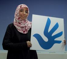 Tawakul Karman with the Human Rights Logo